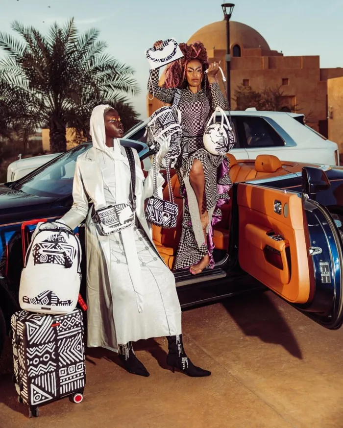 AI8 AFRICAN INTELLIGENCE 8211 ORIGIN STORY BACKPACK SLING Bags SPRAYGROUND