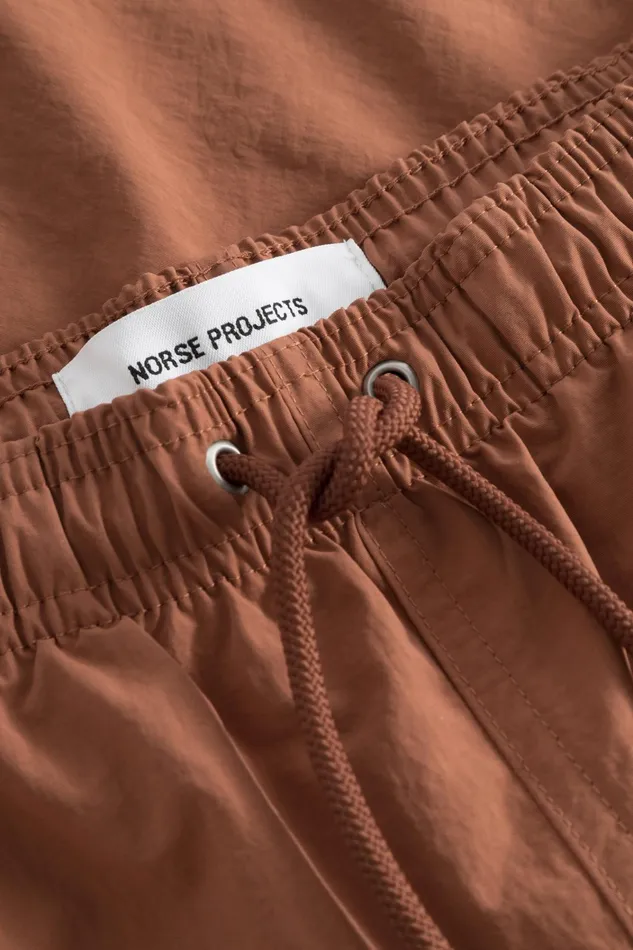 Men Hauge Recycled Nylon Swimmers Red Ochre Norse Projects Shorts